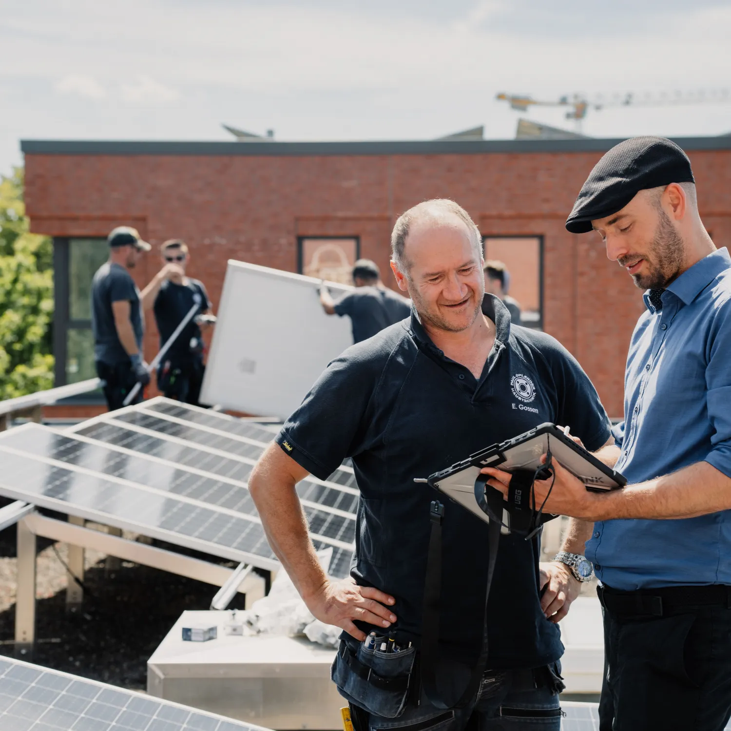 Planungsteam auf dem Solardach